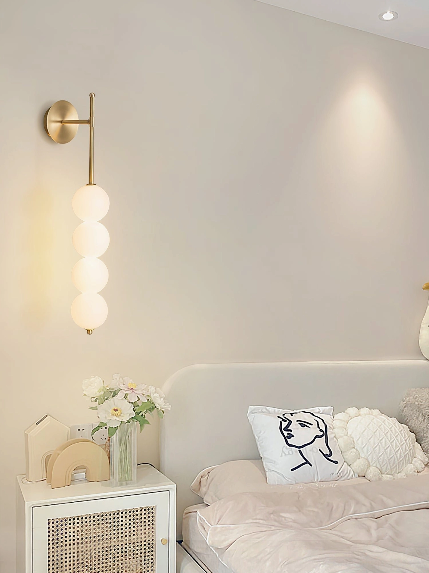 Candied Haws wall sconce in Scandinavian minimalist interior paired with geometric wall art