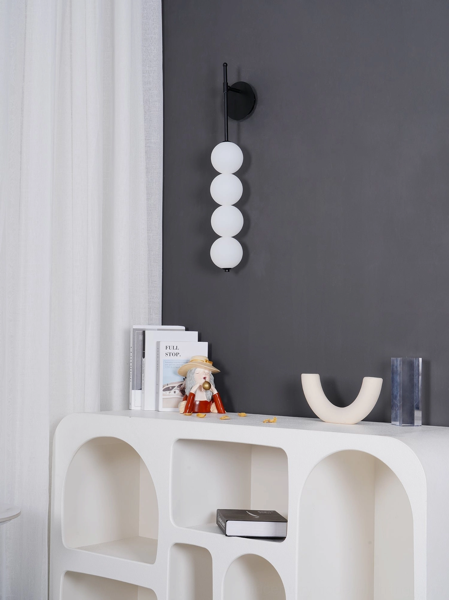 Candied Haws frosted glass wall sconce symmetrical mounting creating architectural focal point