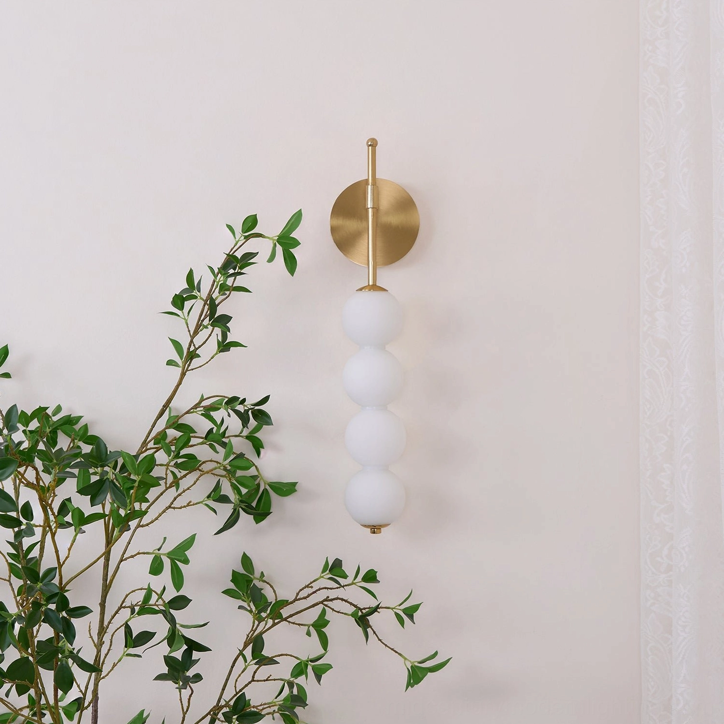 Candied Haws wall sconce unlit showing five frosted glass globes in minimalist Nordic style design