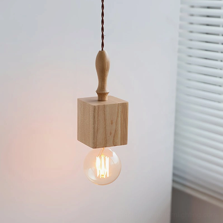 Cano light wood pendant light in natural finish, studio product photography