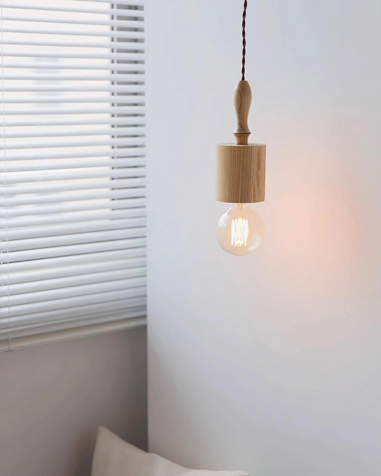 Cano light wood pendant light with neutral finish and architectural geometry, wall mounted