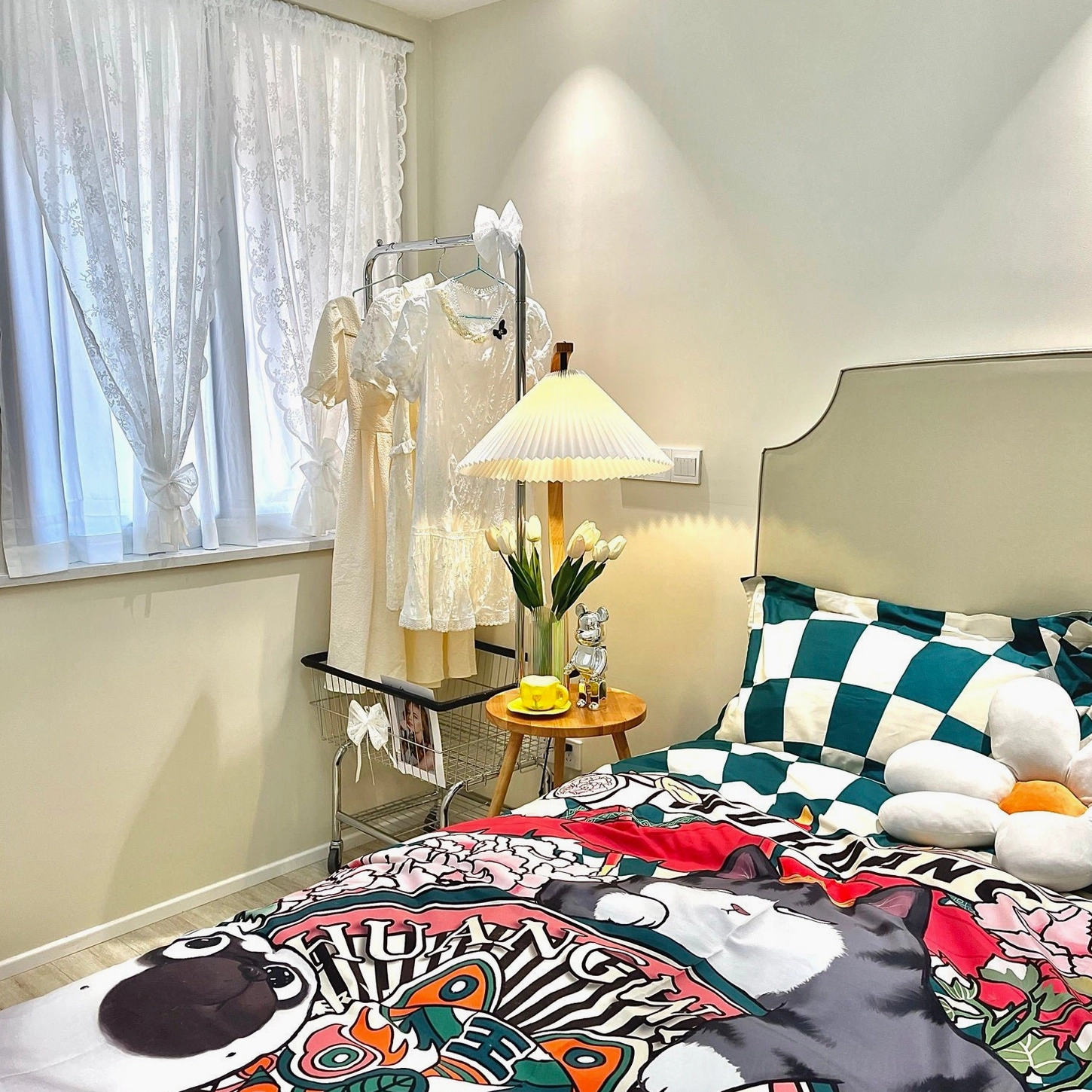 Caprani floor lamp with cream linen shade and natural wood stand in bedroom reading setup