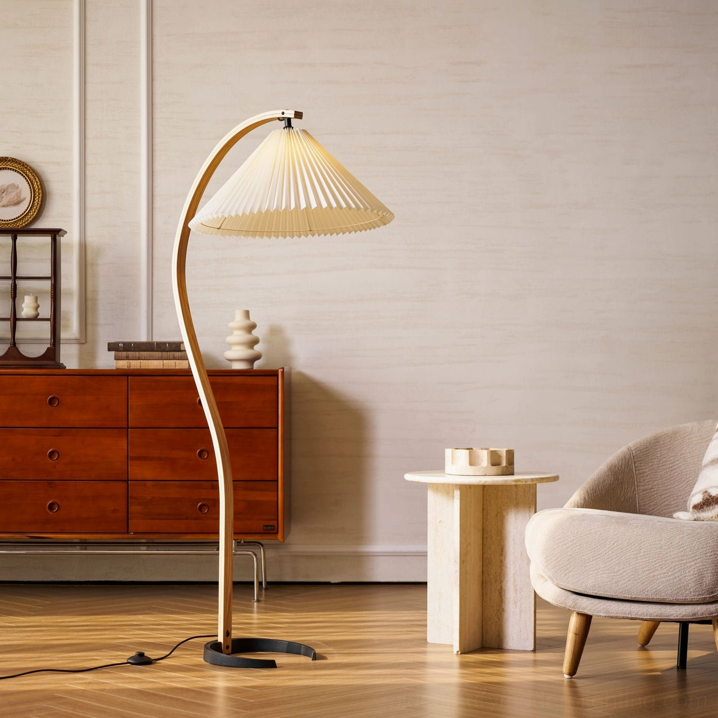 Caprani floor lamp side view next to vintage wooden dresser and upholstered chair against white wall