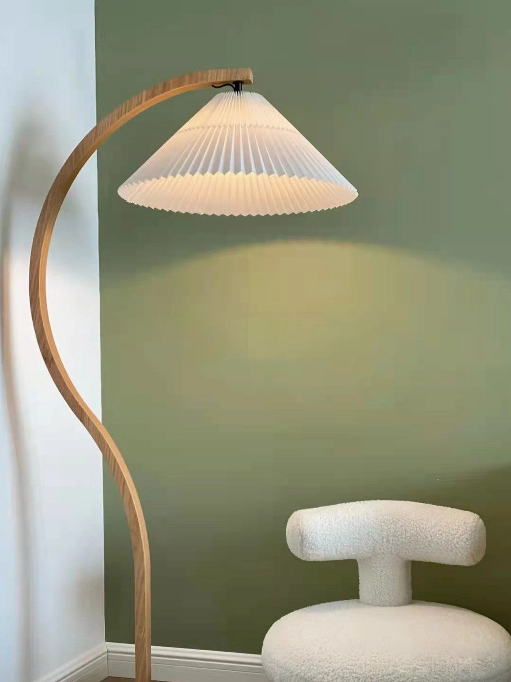 Caprani beech stand curve detail showing organic Scandinavian design lines