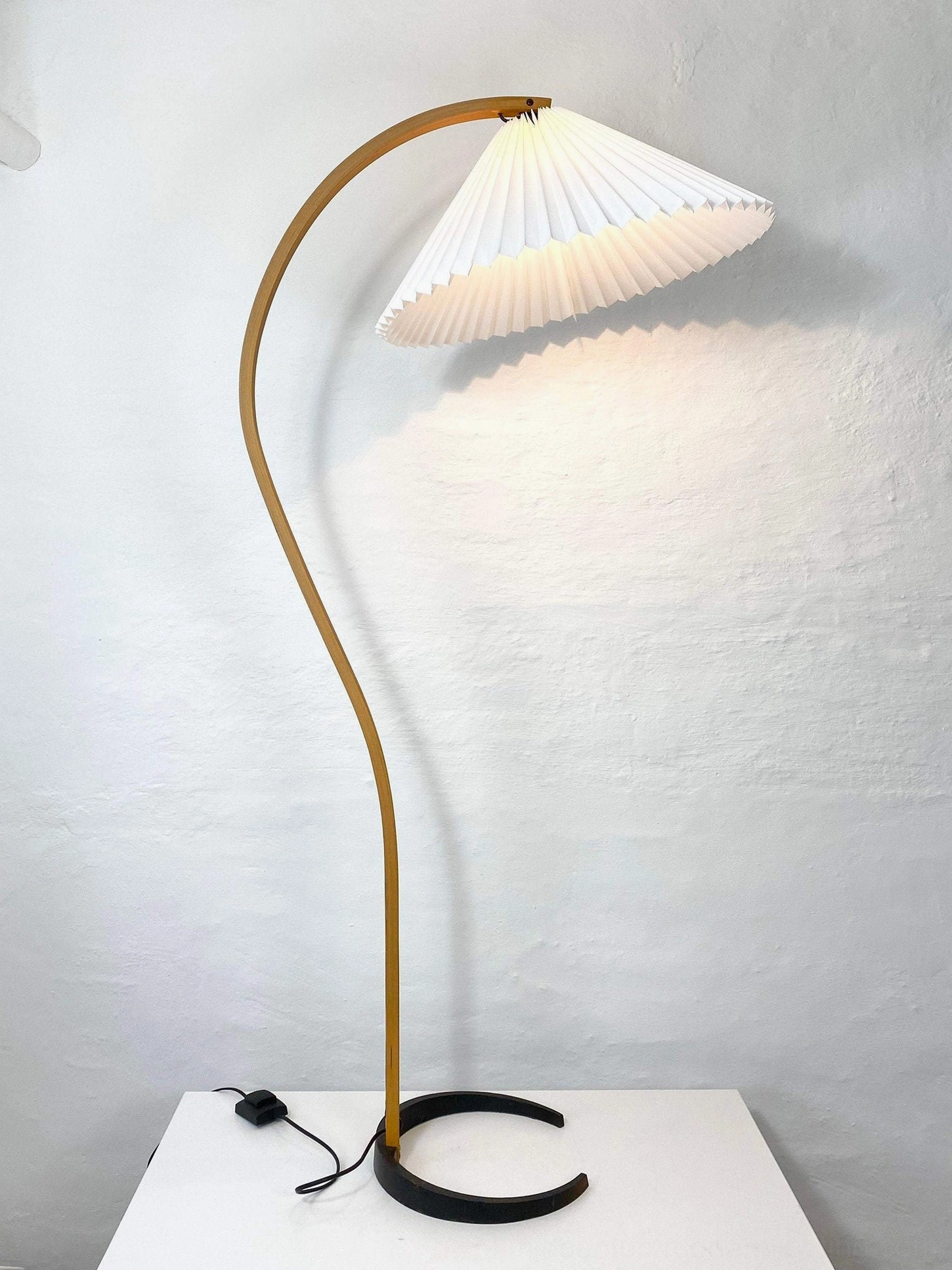 Caprani beige linen shade floor lamp warm neutral variant in interior styling