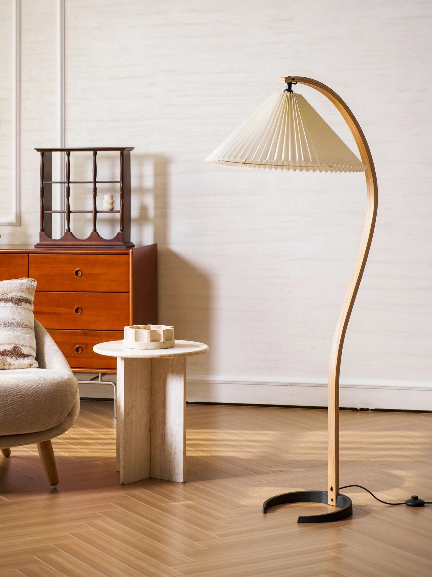 Caprani floor lamp cast-iron base detail showing weight and stability construction