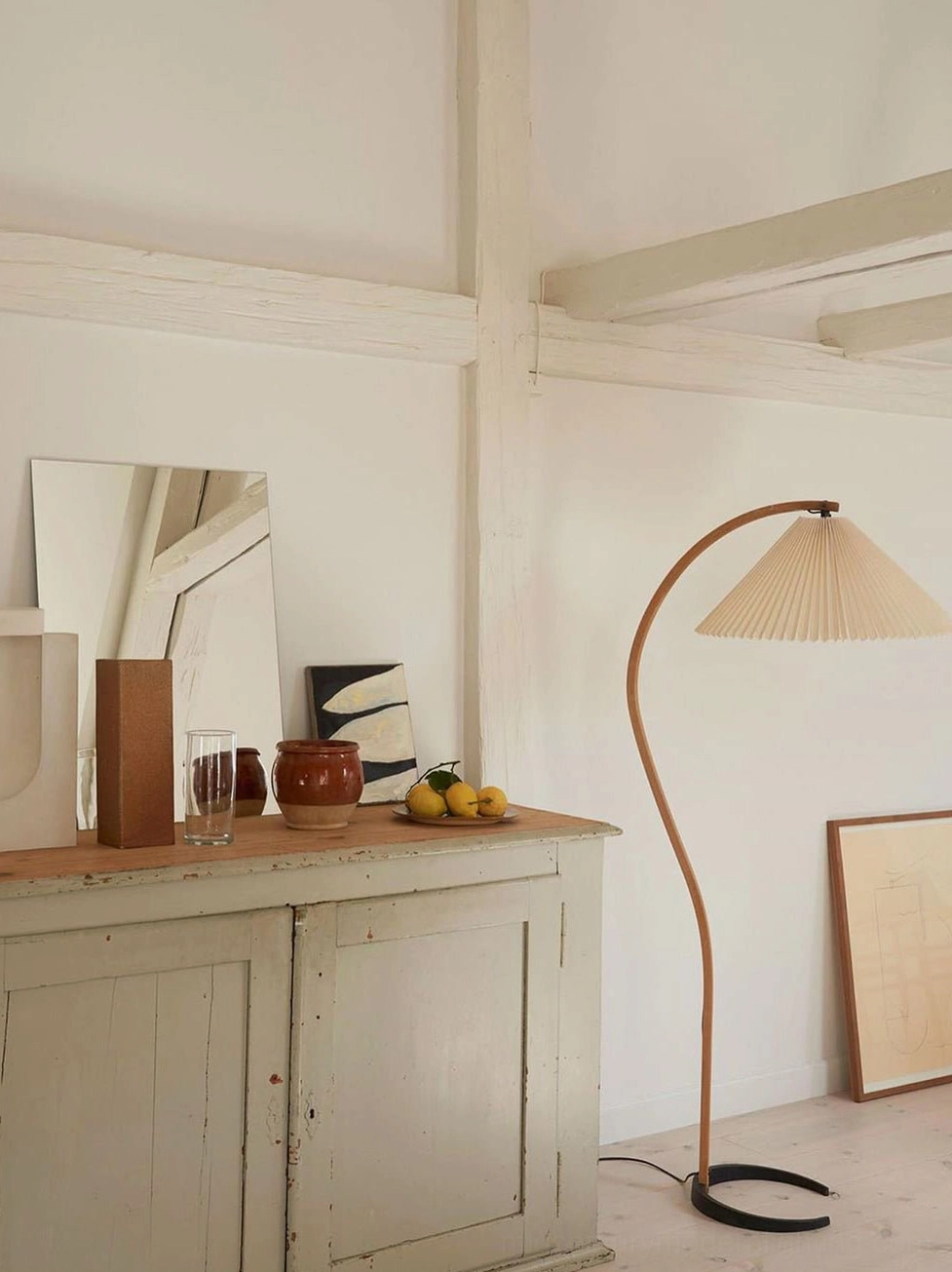 Caprani beech wood floor lamp product detail showing curved stand and linen shade construction