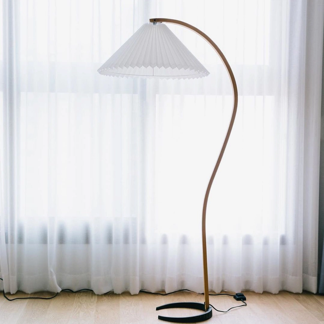 Caprani beech floor lamp showing scale and proportions in living room setting