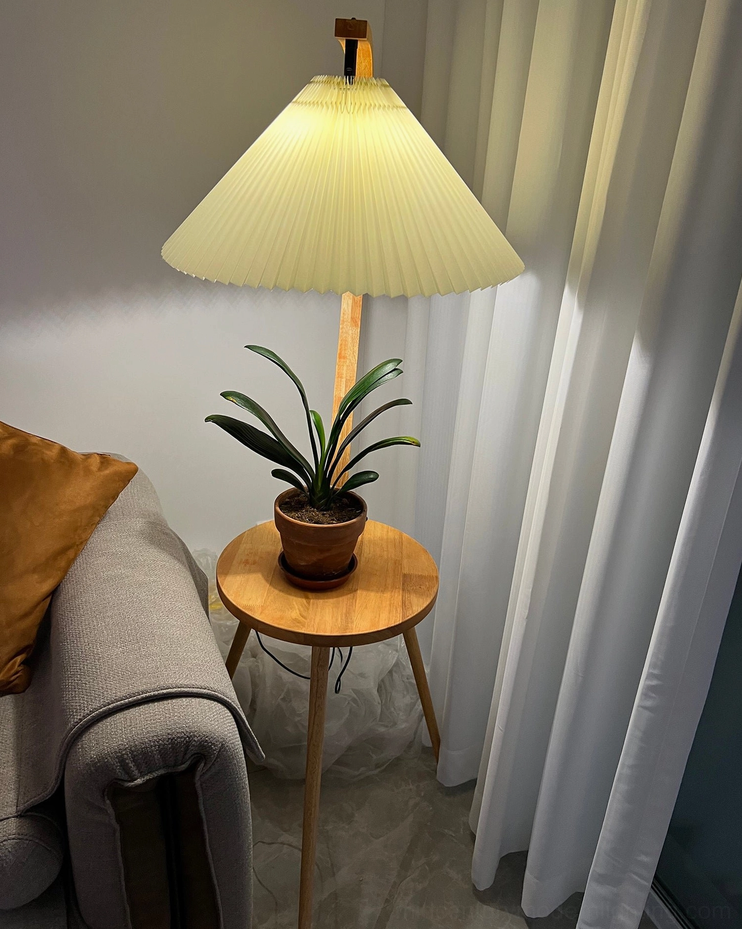 Caprani mid-century modern floor lamp with wood grain detail and quality construction materials