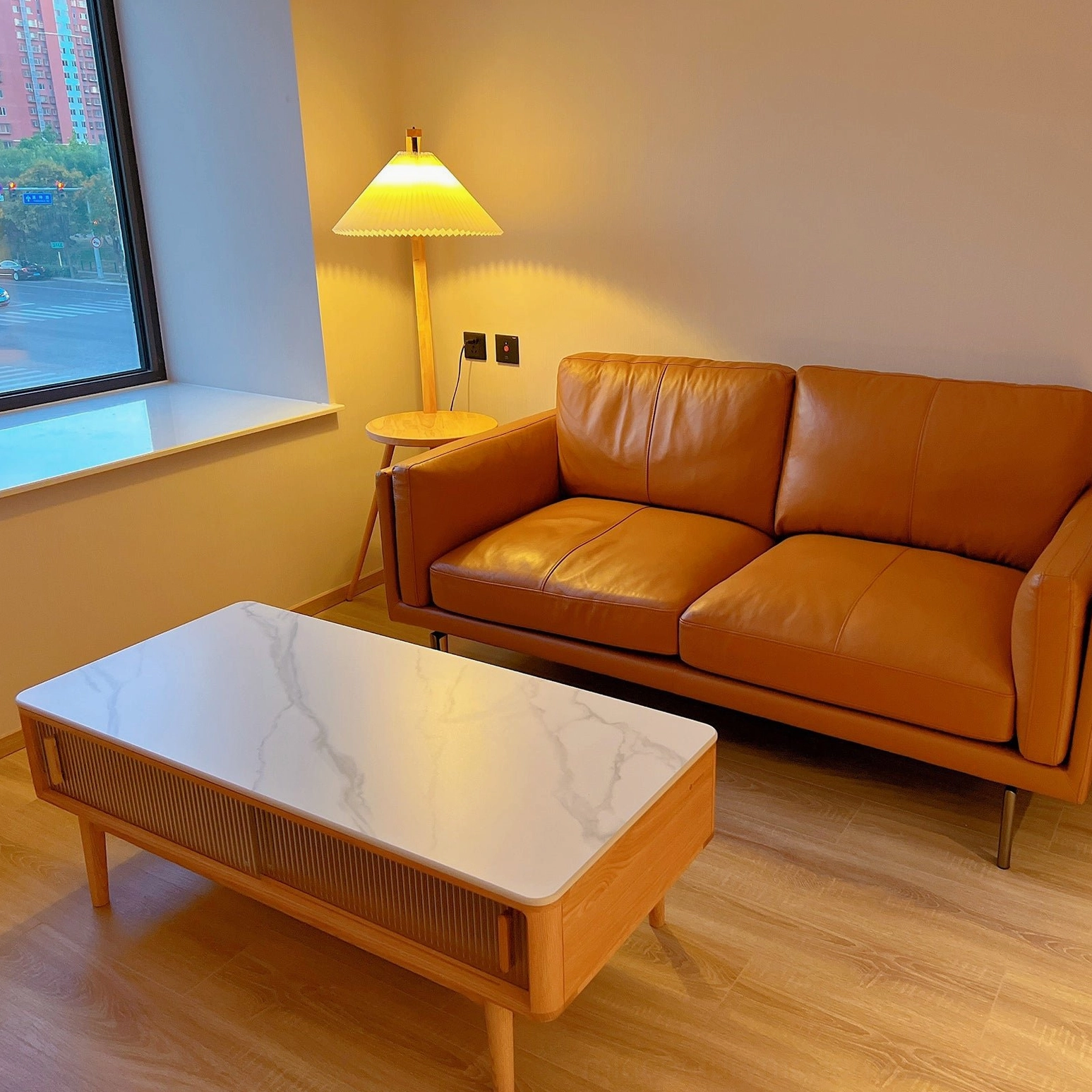Caprani mid-century tray floor lamp with integrated side table in stylish residential interior