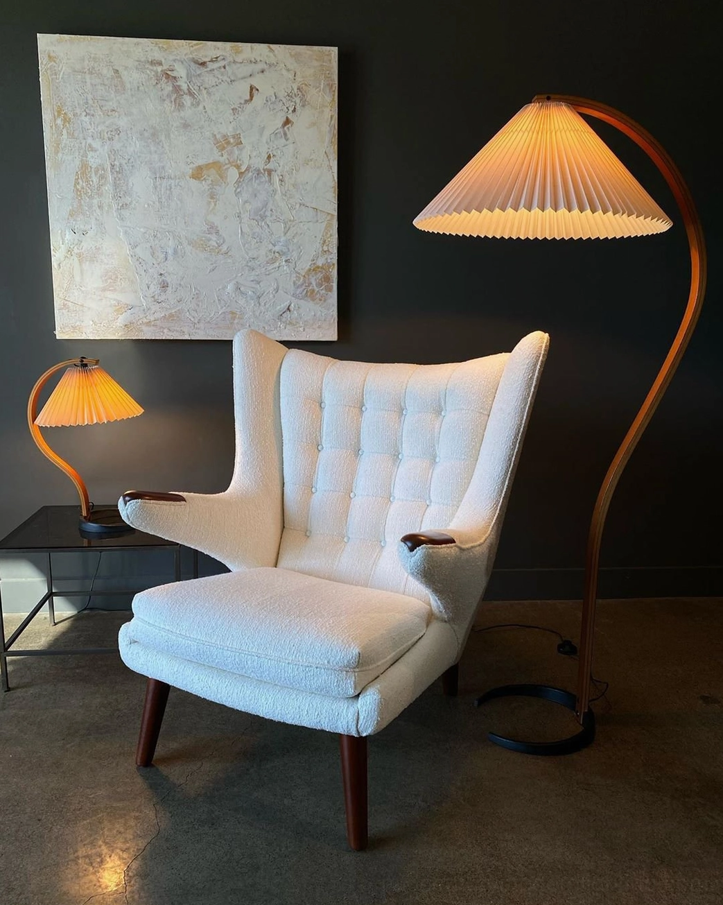 Caprani floor lamp in reading nook corner with leather armchair and wool throw