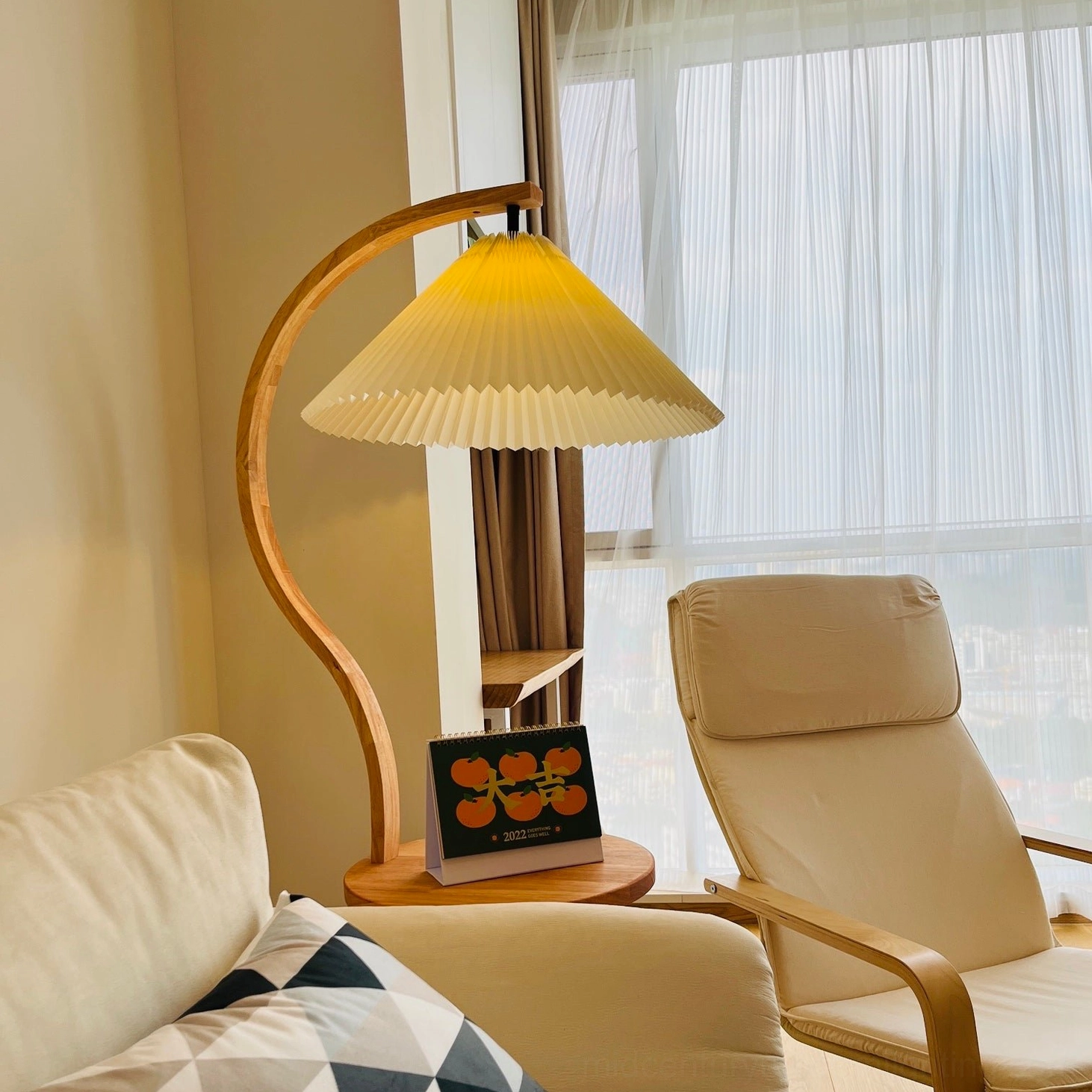 Caprani mid-century modern floor lamp demonstrating side table functionality with decorative objects
