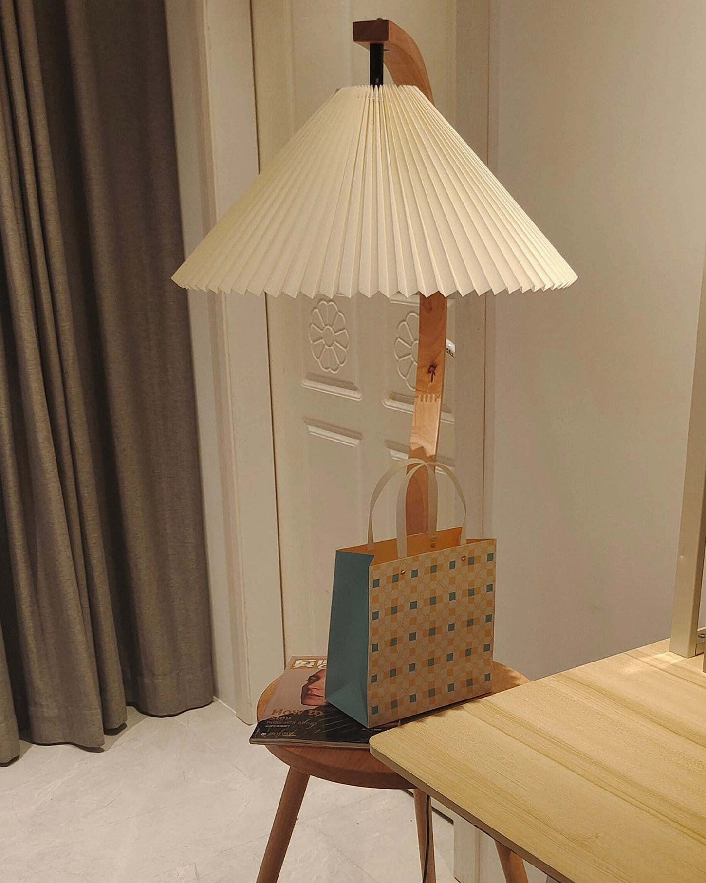 Caprani floor lamp with warm illumination creating inviting home ambiance and aesthetic appeal