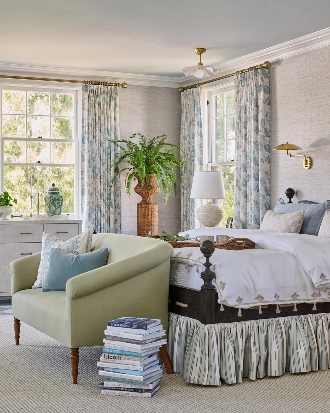 Capri ceiling lamp flush mount in classic primary bedroom with green upholstered furniture and patterned curtains