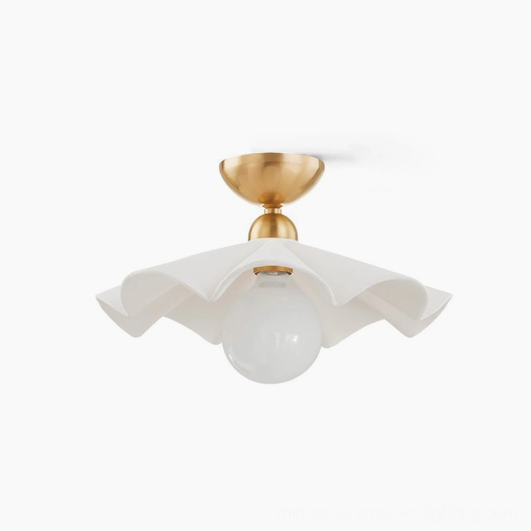Capri ruffled ceramic flush mount ceiling lamp with polished brass base and exposed glass bulb detail
