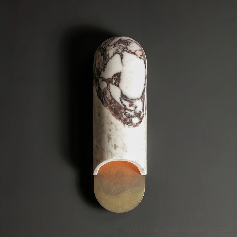 Side profile of purple marble capsule wall lamp with gradient warm light base on dark gray wall