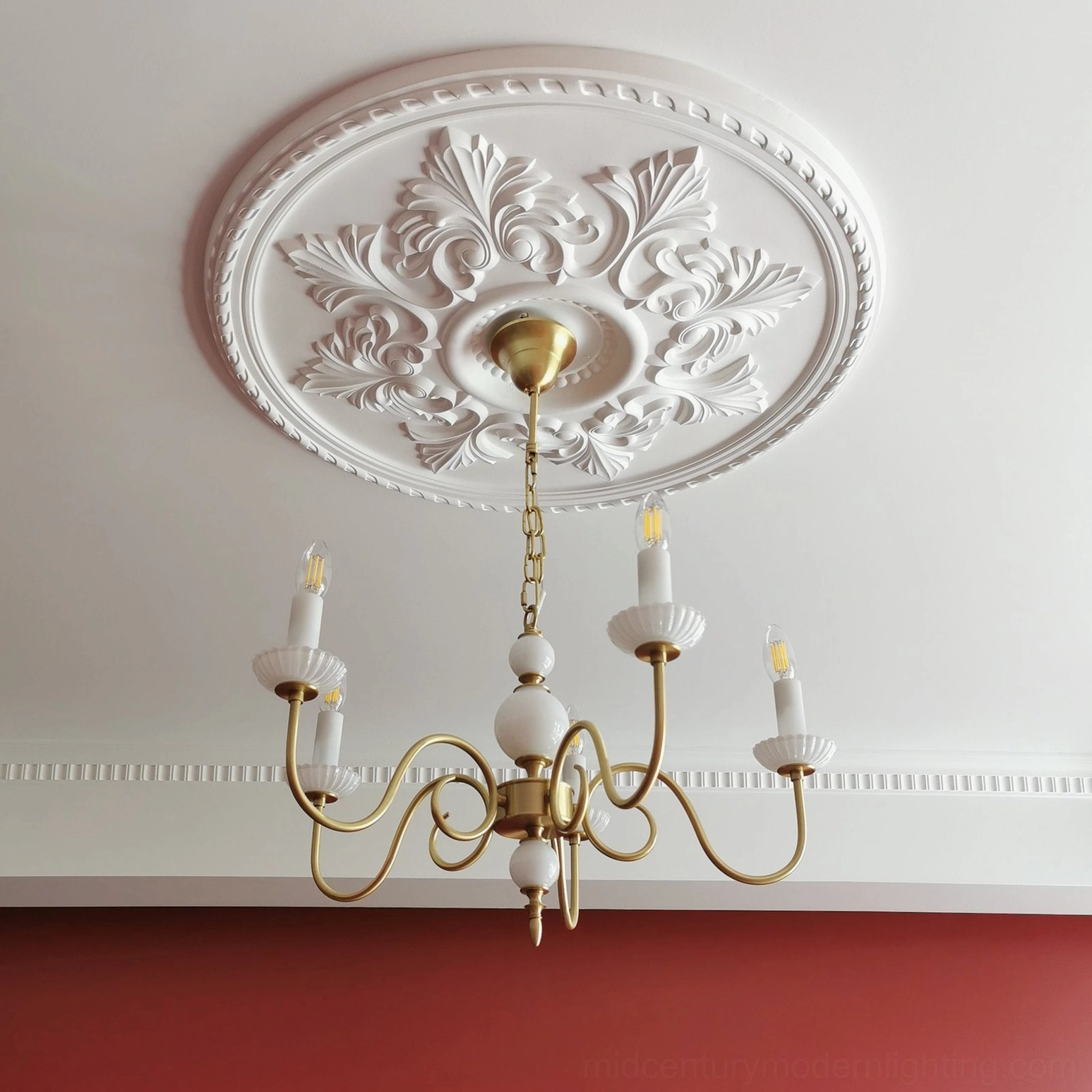 Carlita 3-light brass chandelier in compact interior space with modern furnishings