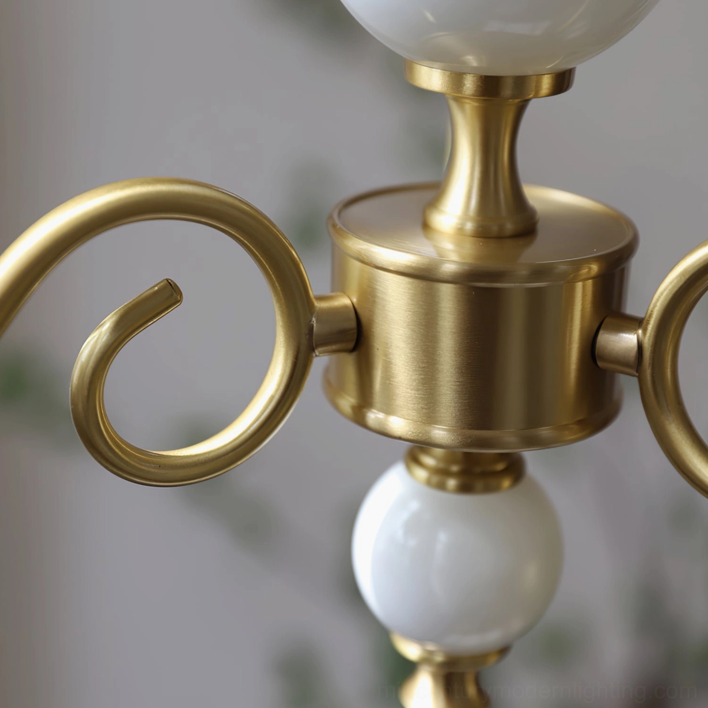 Carlita 5-light brass chandelier illuminated in bedroom retreat setting