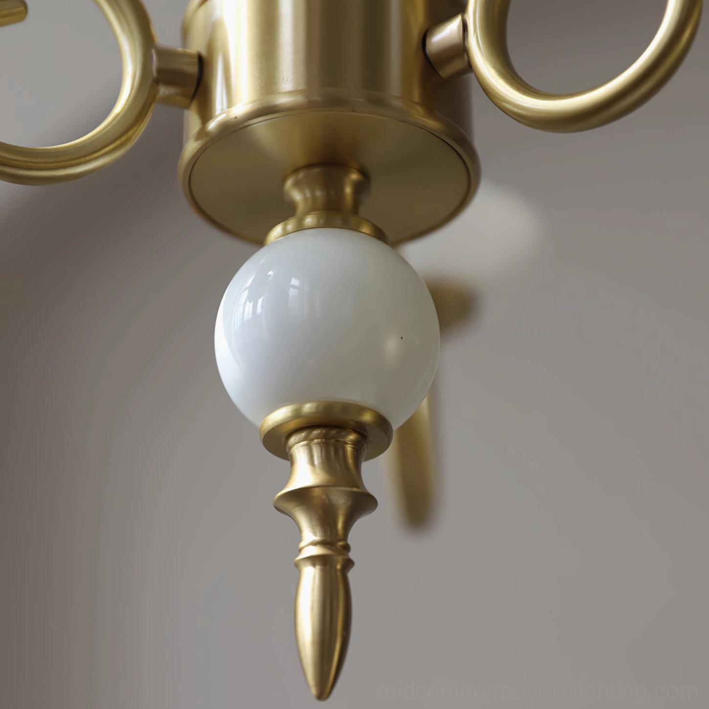 Carlita brass chandelier installed in eclectic living space with vintage and modern mix