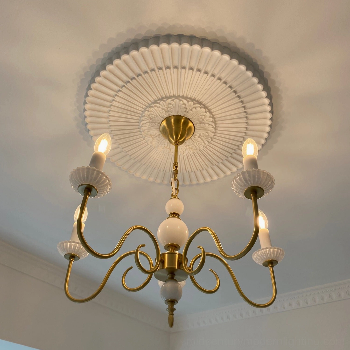 Carlita chandelier showing full assembly with all ceramic and brass components