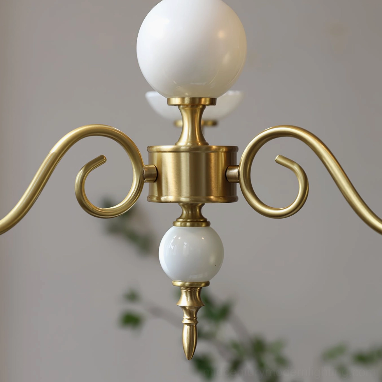 Carlita multi-head brass chandelier suspended showing full light distribution design