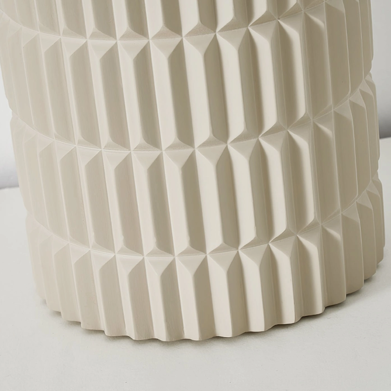 Carran fluted ceiling lamp front slight side angle, complete 360-degree vertical ribbed texture