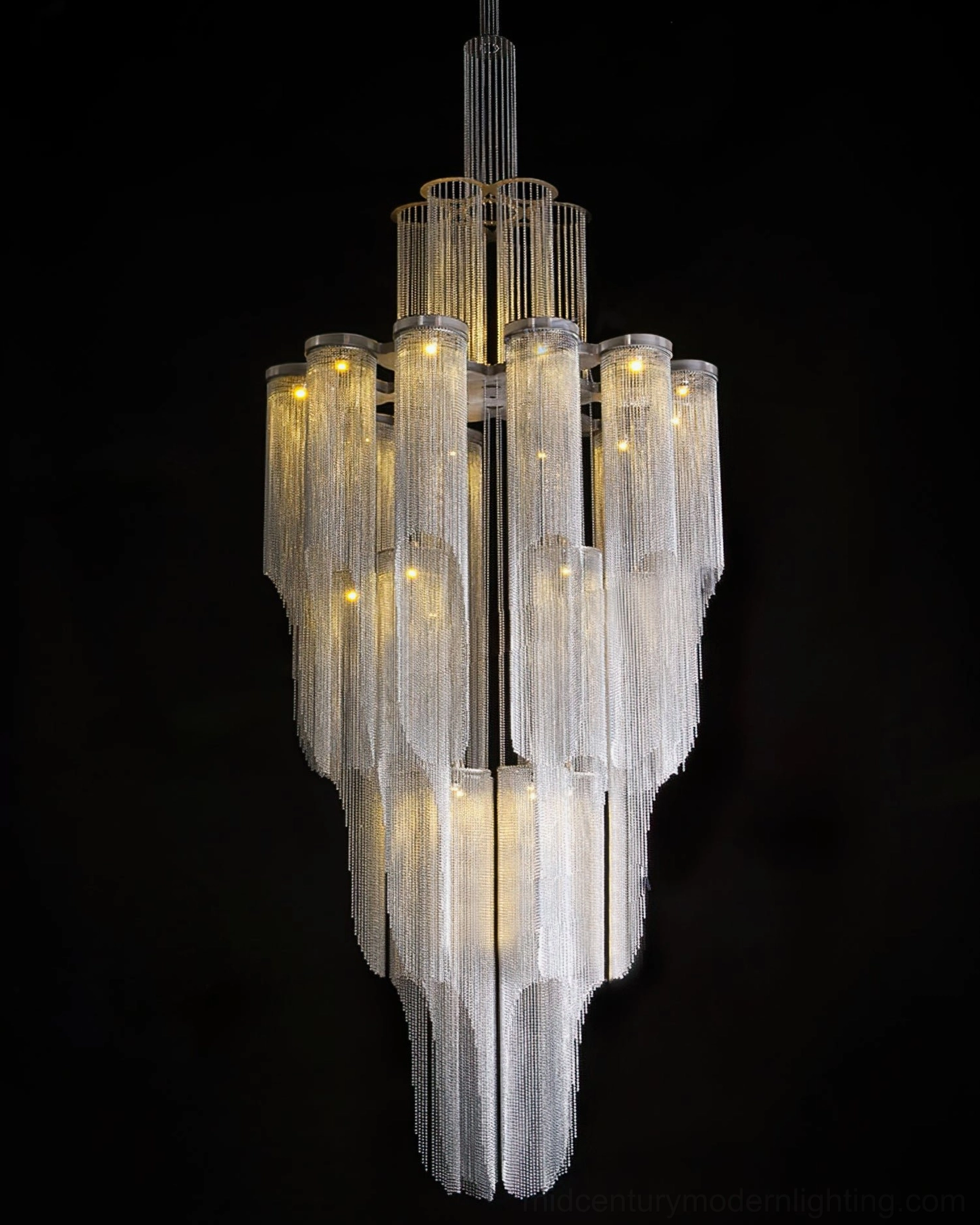 Cascade Silver Chandelier ambient lighting effect in sophisticated interior setting