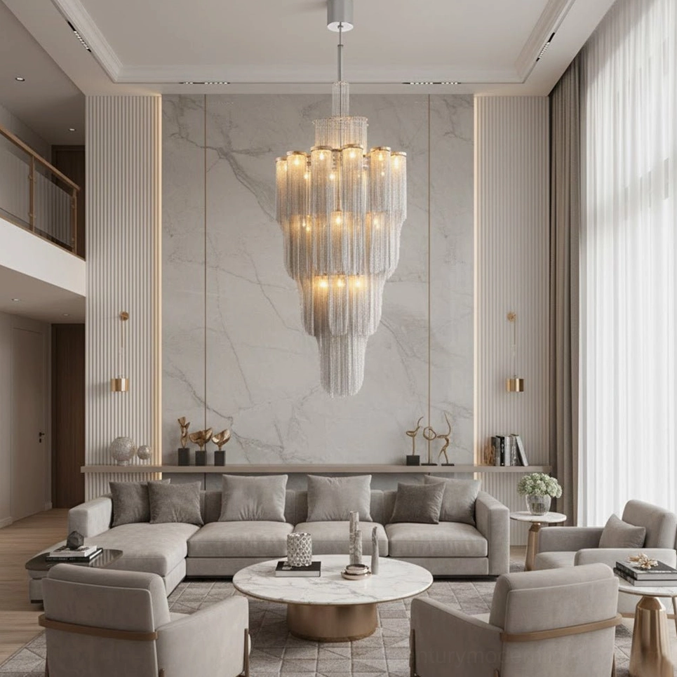 Cascade Silver Chandelier installed in minimalist luxury living room with marble wall accent