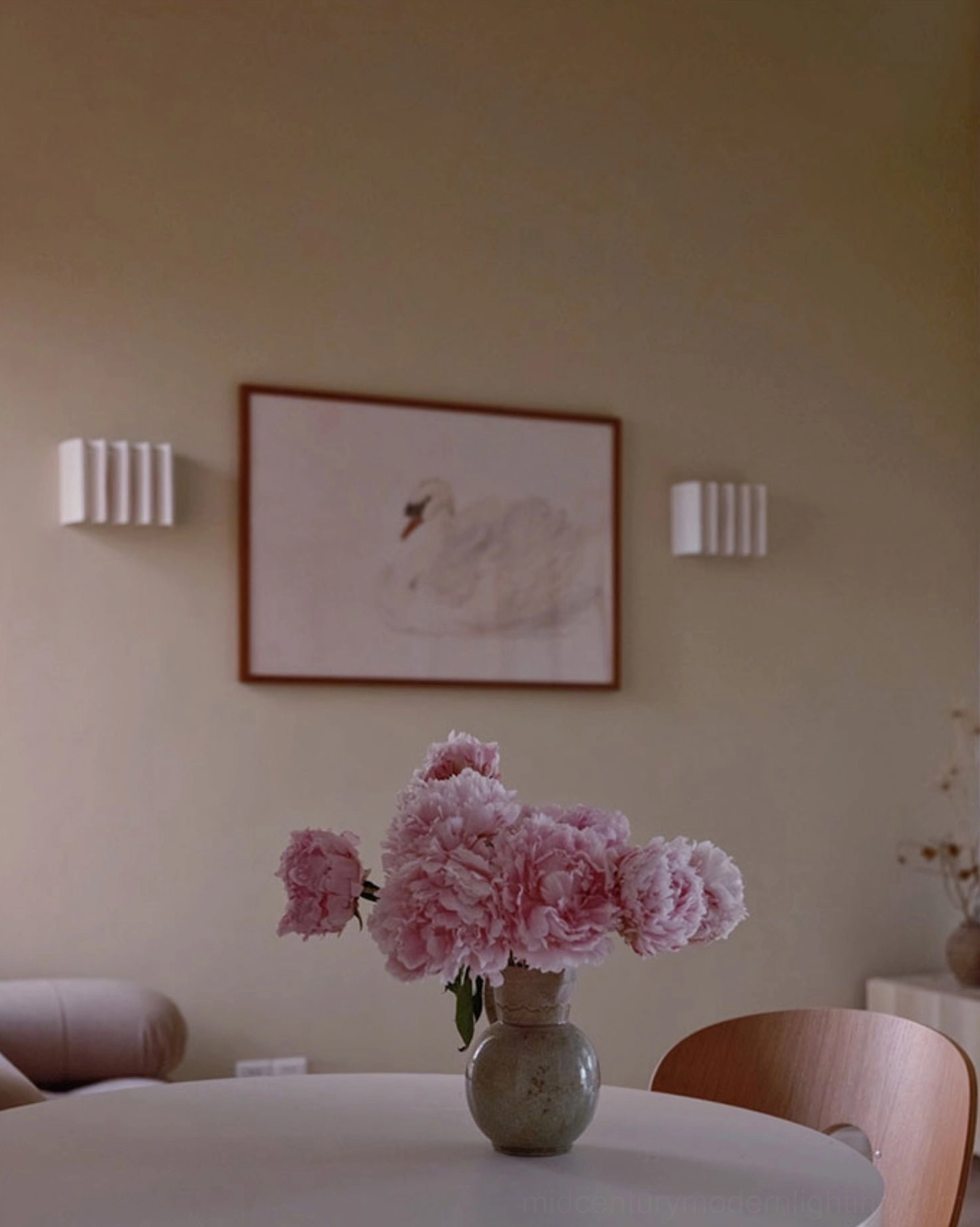 Cascade wall sconce full product display in neutral studio setting