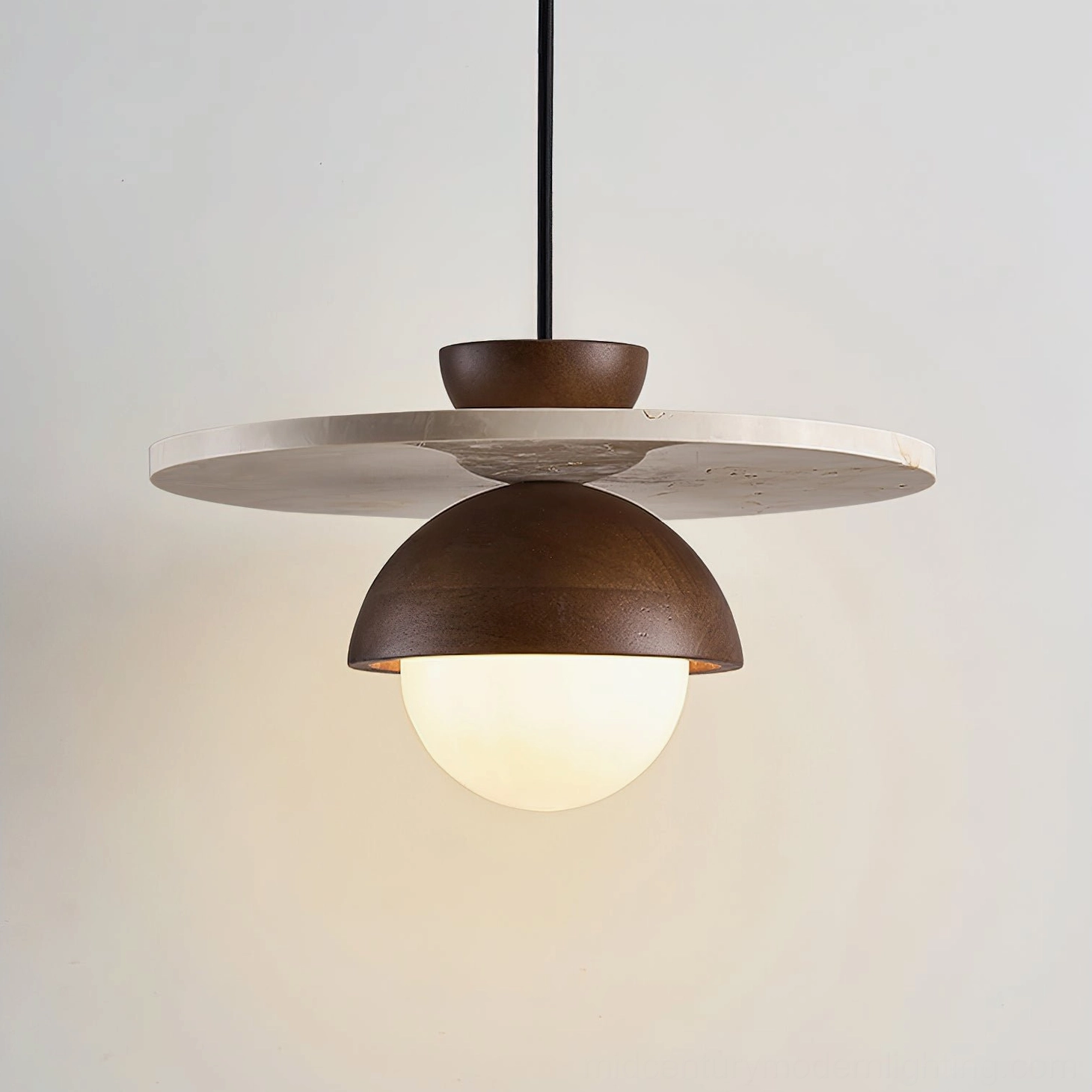 Cassini wooden pendant lamp showing layered construction with dark brown dome and frosted glass bulb detail