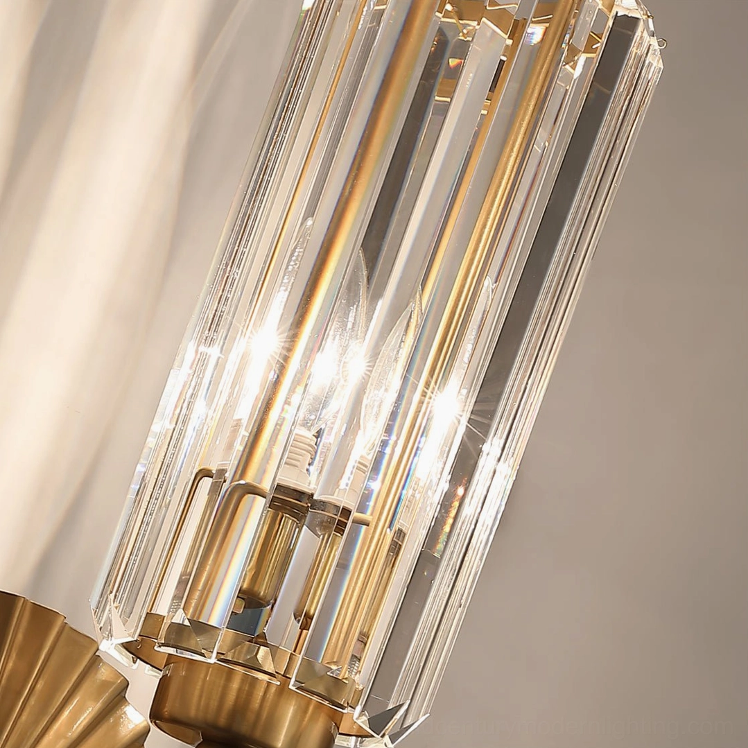 Close-up macro detail of Cecily sconce crystal shade showing vertical ribbed texture and brass metal fixture