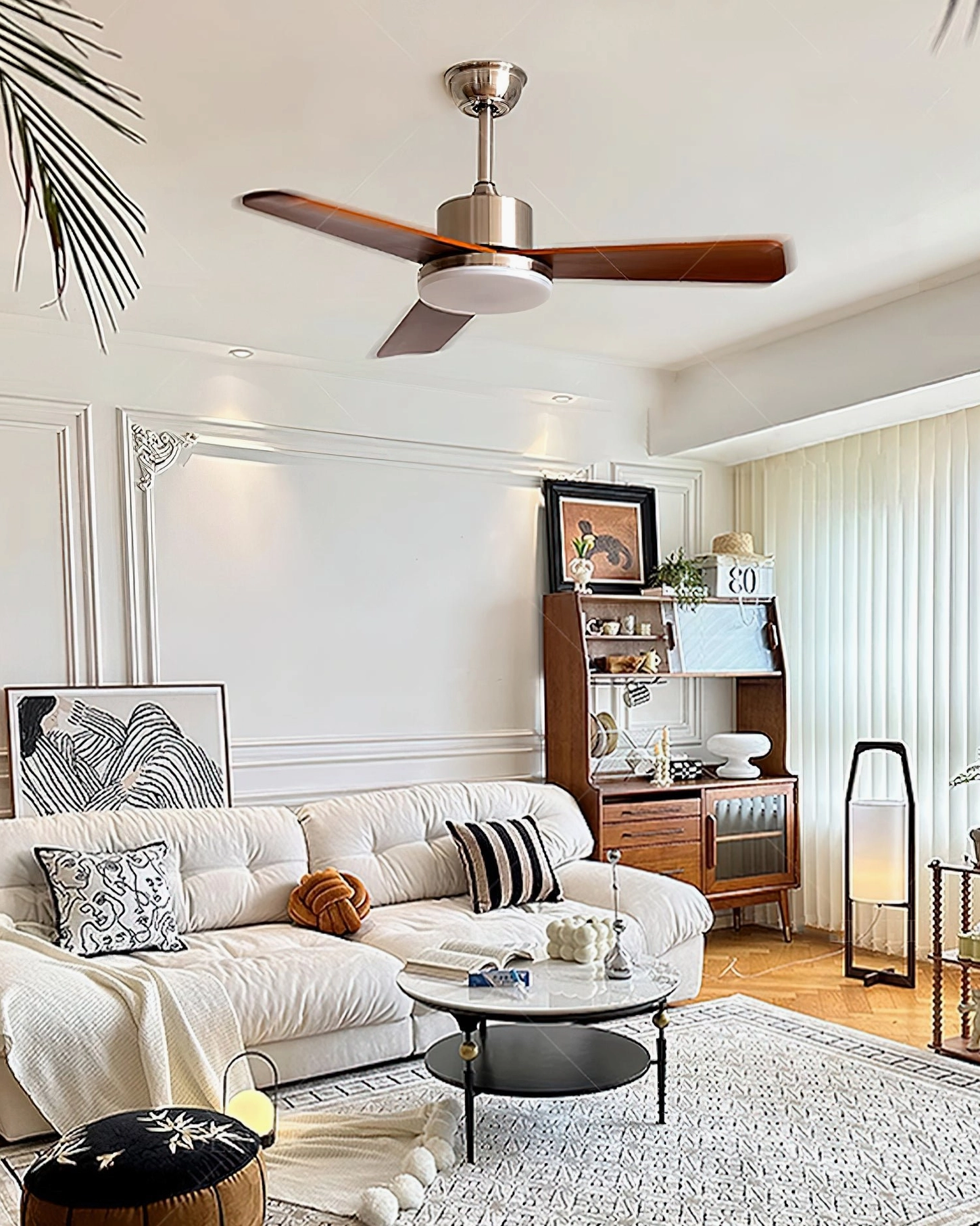 Cozy American style living room with ceiling fan light, tufted sofa, and decorative wooden cabinet furniture
