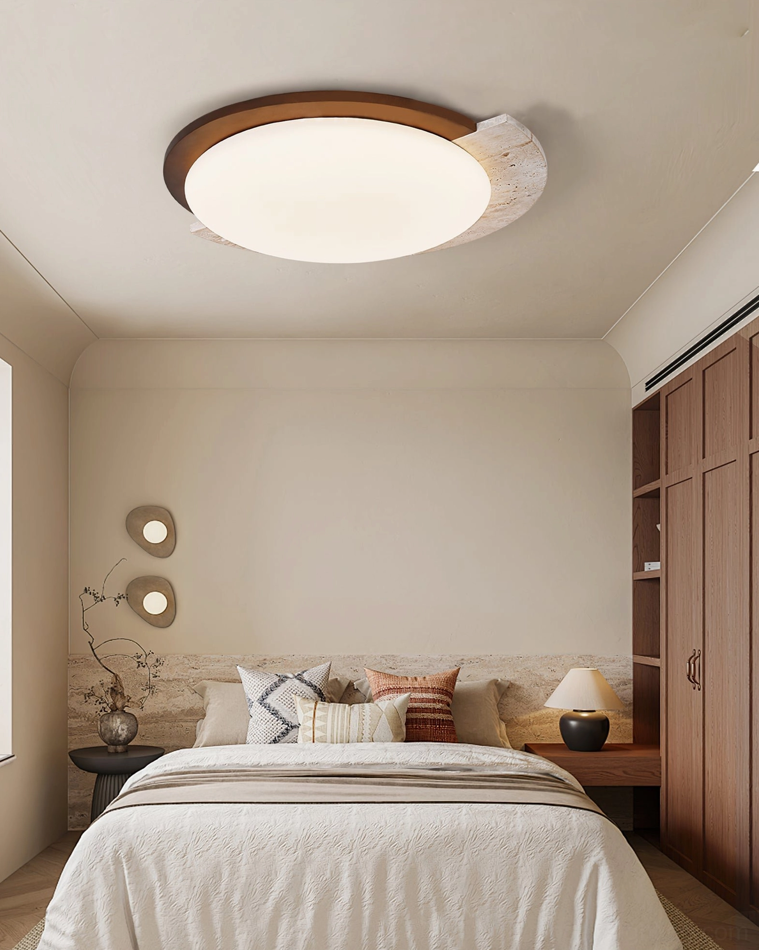 High-angle view of modern asymmetrical ceiling lamp in minimalist bedroom with built-in wood cabinets and throw pillows