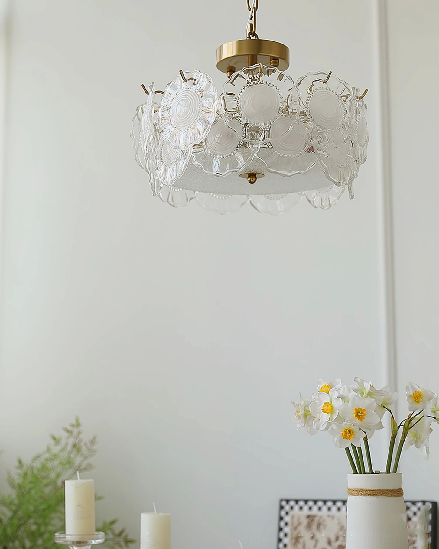 Overhead angled view of fully lit textured glass ceiling lamp showing embossed pattern and warm illumination