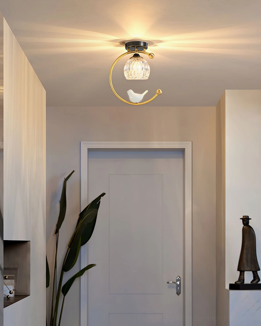 Brass finish ceramic bird ceiling lamp showing warm metallic patina and vintage character