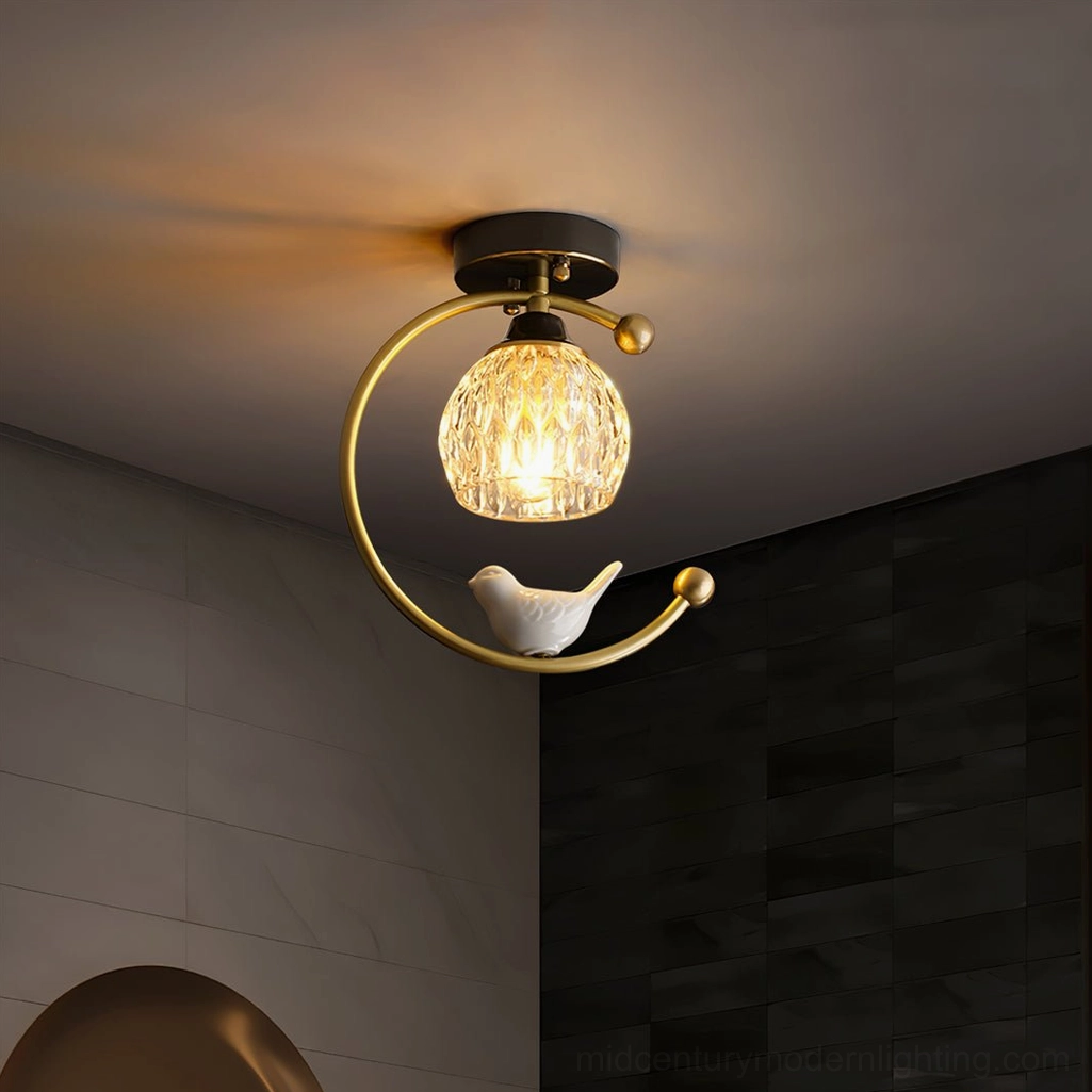 White finish ceramic bird ceiling lamp in contemporary Scandinavian interior design setting