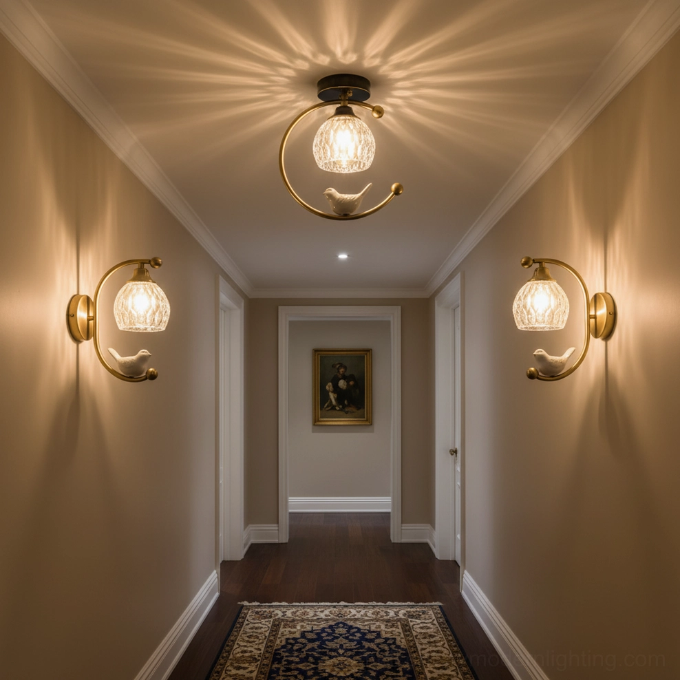 Matching ceramic bird wall sconces and ceiling lamp fixtures installed in traditional hallway interior
