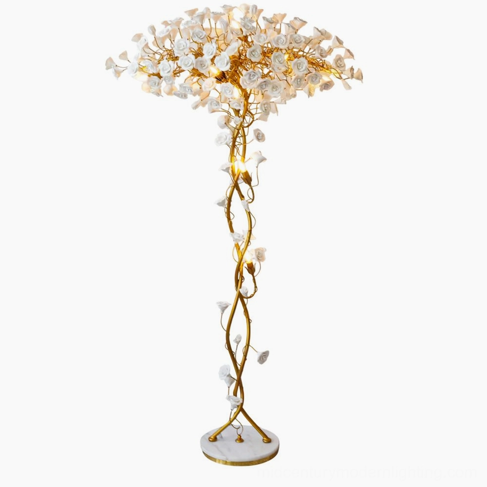 Ceramic flower floor lamp full frontal view with twisted brass pole and marble base on white background