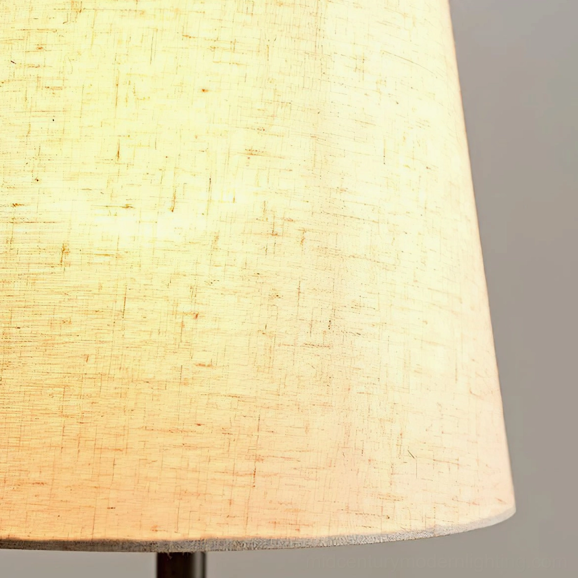 Handcrafted ceramic lamp base showing natural material texture, rustic mid-century modern sculptural form