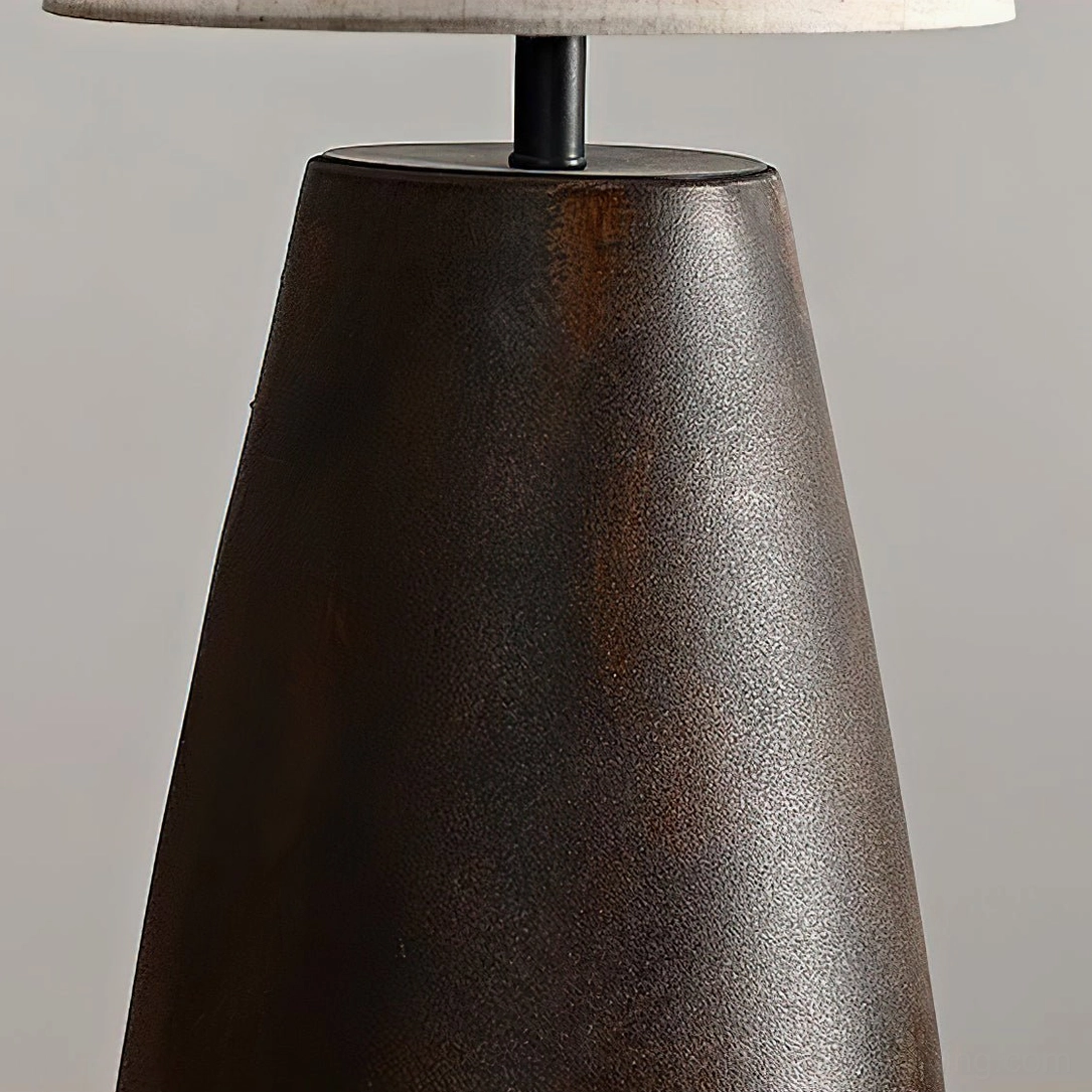 Ceramic tapered table lamp rust finish with cream fabric shade, mid-century modern design detail photography