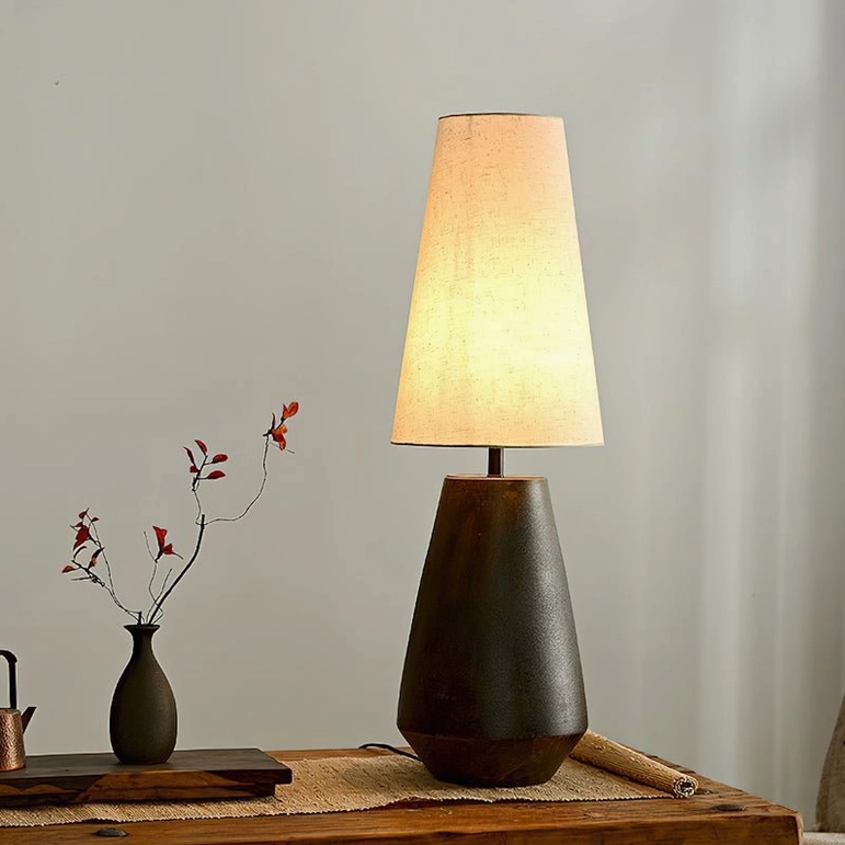 Ceramic tapered lamp white and rust finish options with cream fabric shade, side-by-side design comparison