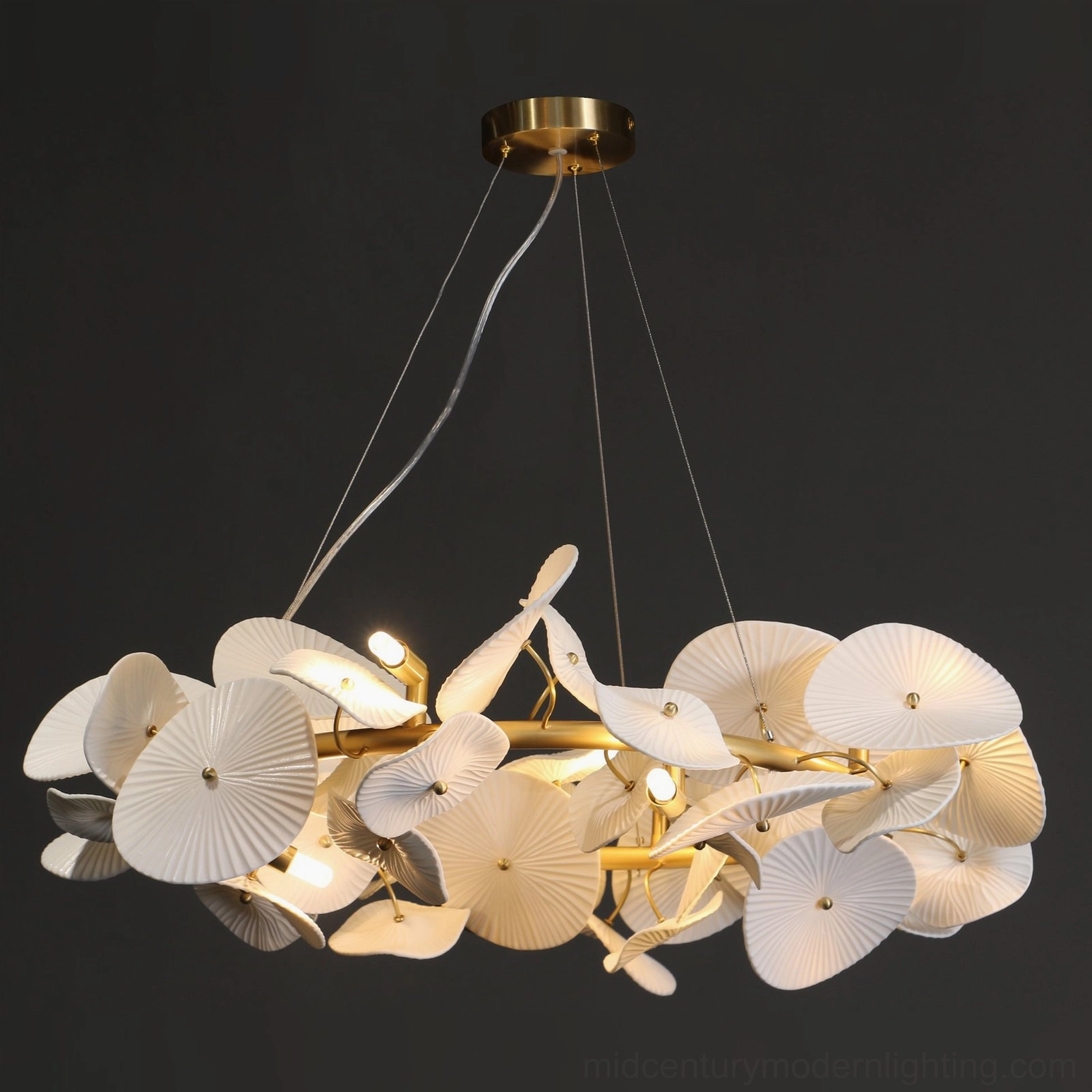 Ceramic wreath pendant light architectural detail showing brass frame geometry and ceramic petal arrangement precision