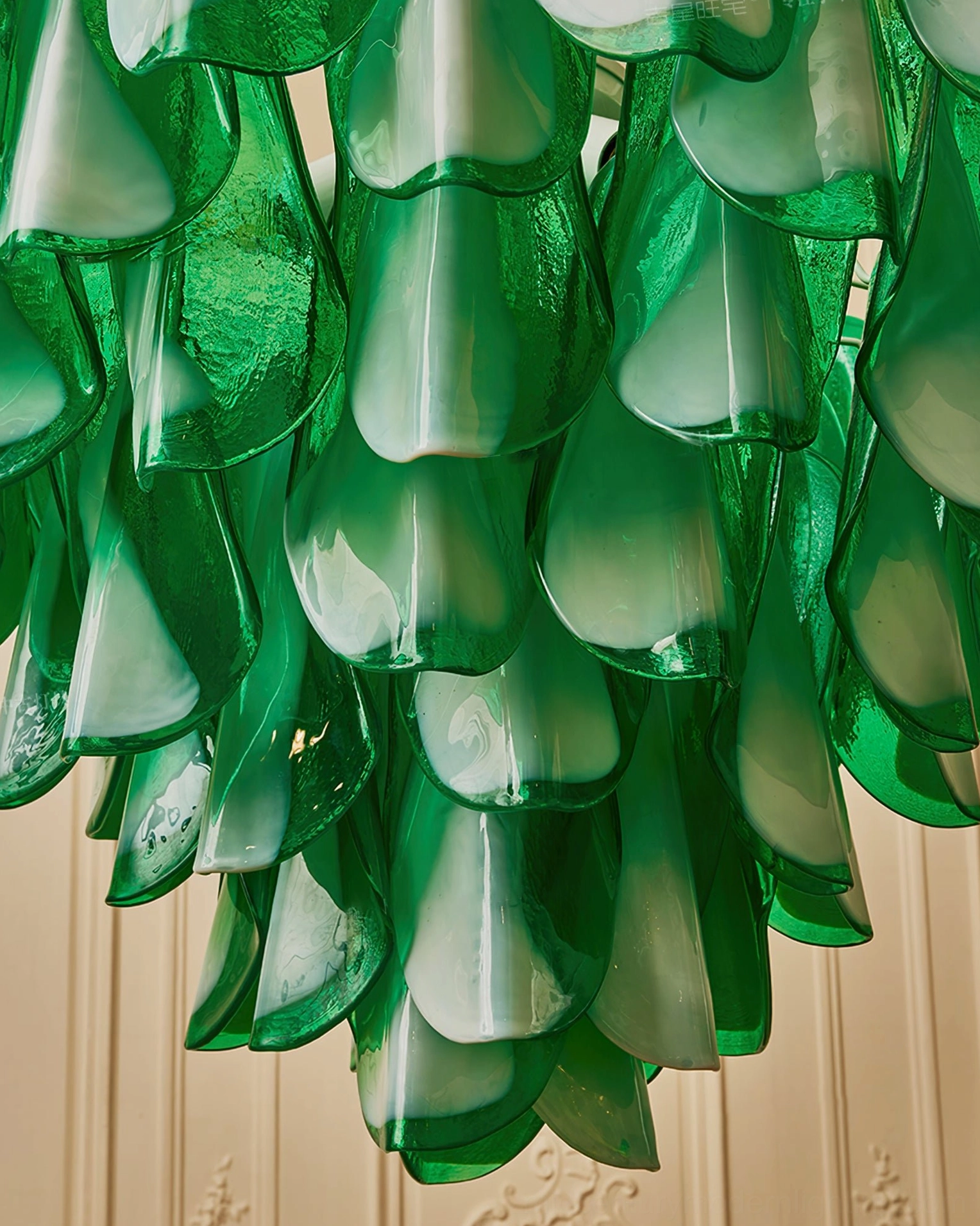 Bottom view of tiered chandelier showing stacked layered glass petals and dense architectural design structure