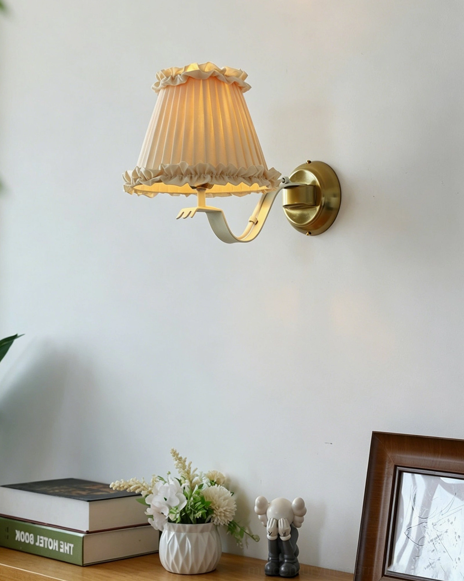 Chantal wall sconce side view in home setting with books and florals for vintage country décor styling