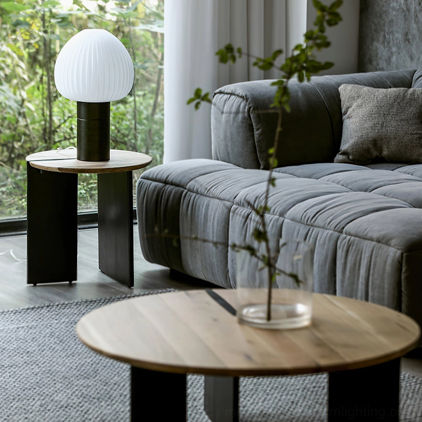 Chanya frosted glass lamp in bright minimalist interior with floor-to-ceiling windows and natural light