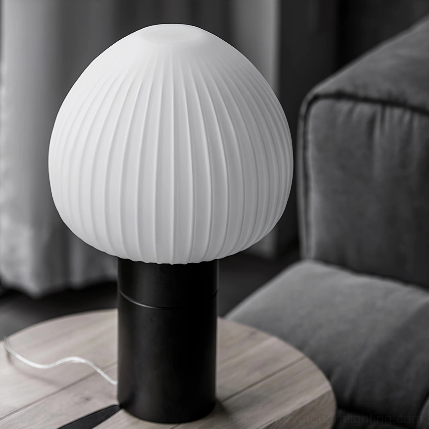 Chanya table lamp styled in modern Nordic living room with grey sofa and wooden side table, Scandinavian interior design