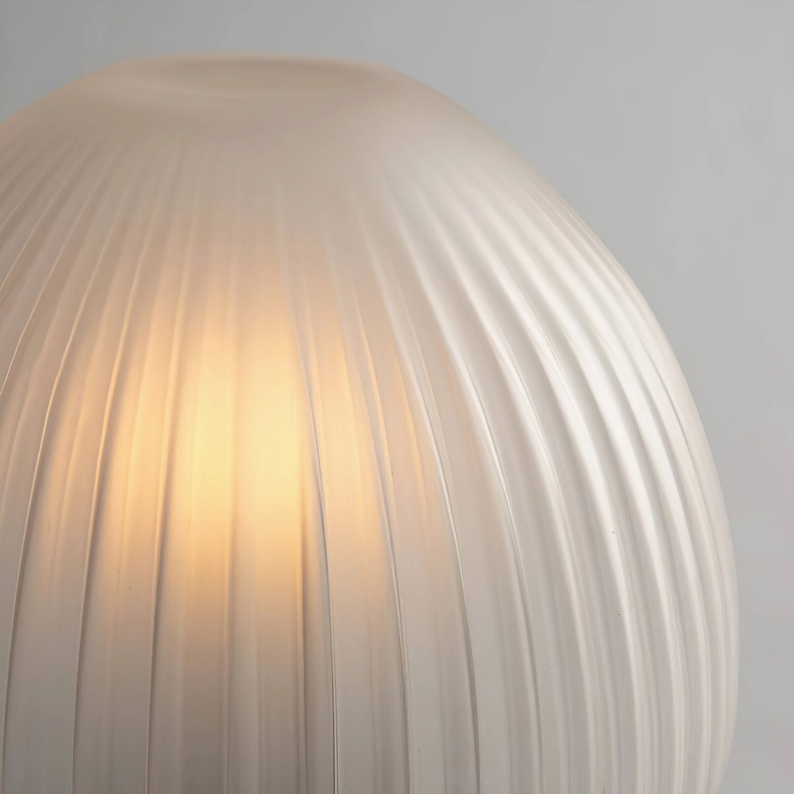 Chanya frosted glass shade extreme close-up showing vertical ribbed texture and light transmission warmth