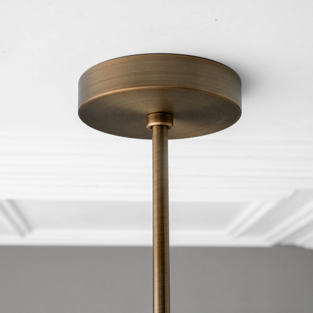 Chelso ceiling mount base and canopy with brushed bronze finish installed on residential ceiling