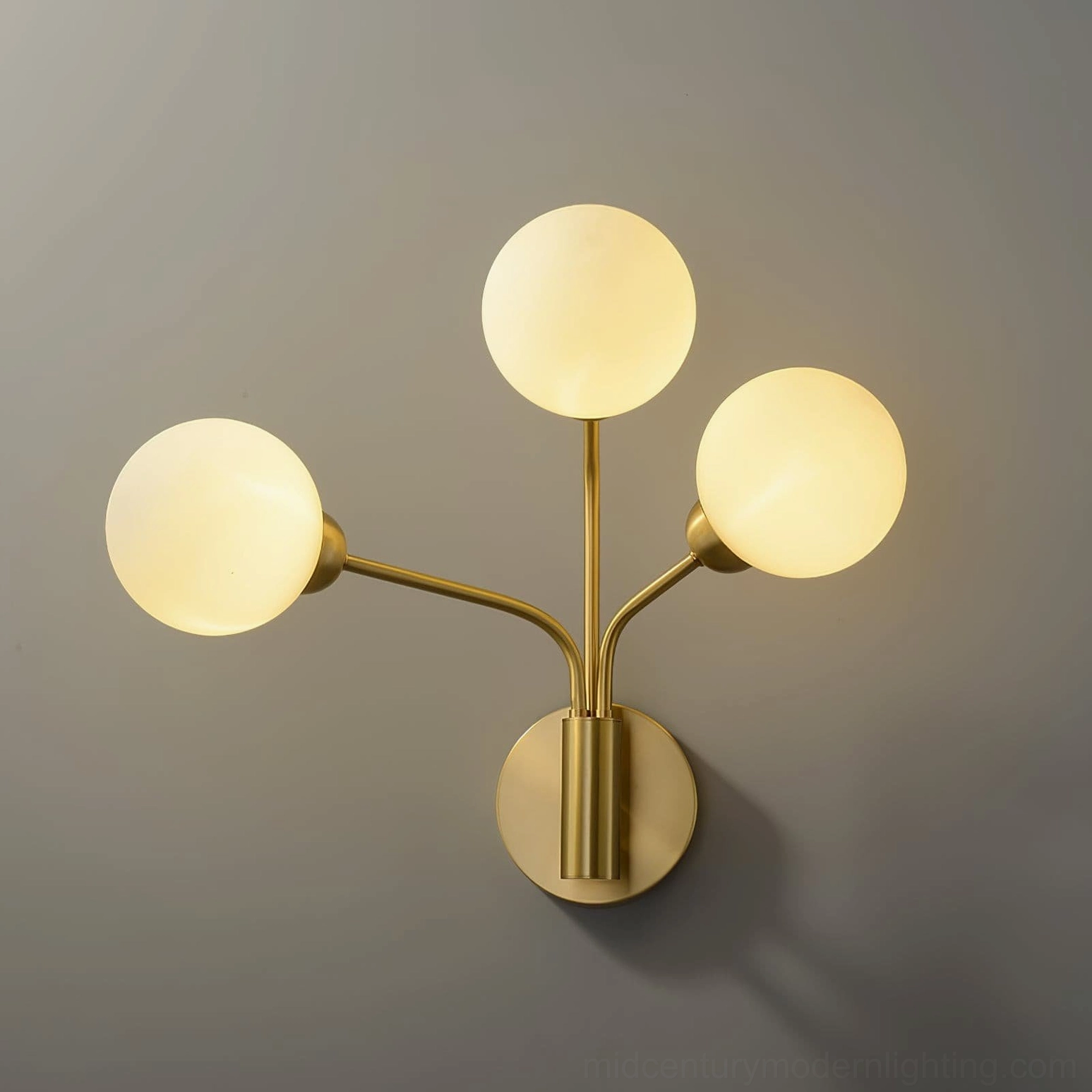 Chelso wall sconce medium size 48.5 cm three-light brass design