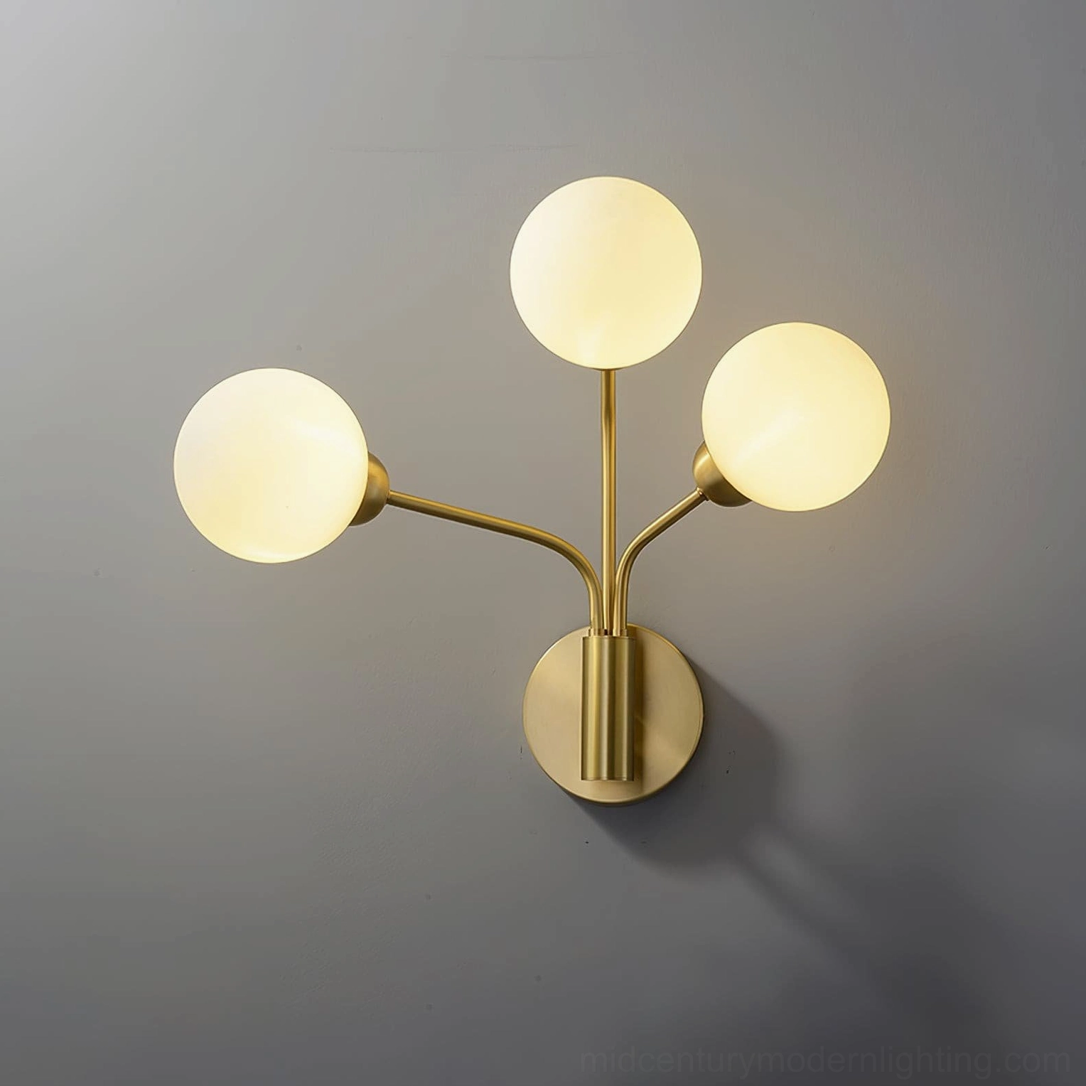 Chelso wall lamp sculptural brass framework organic botanical form
